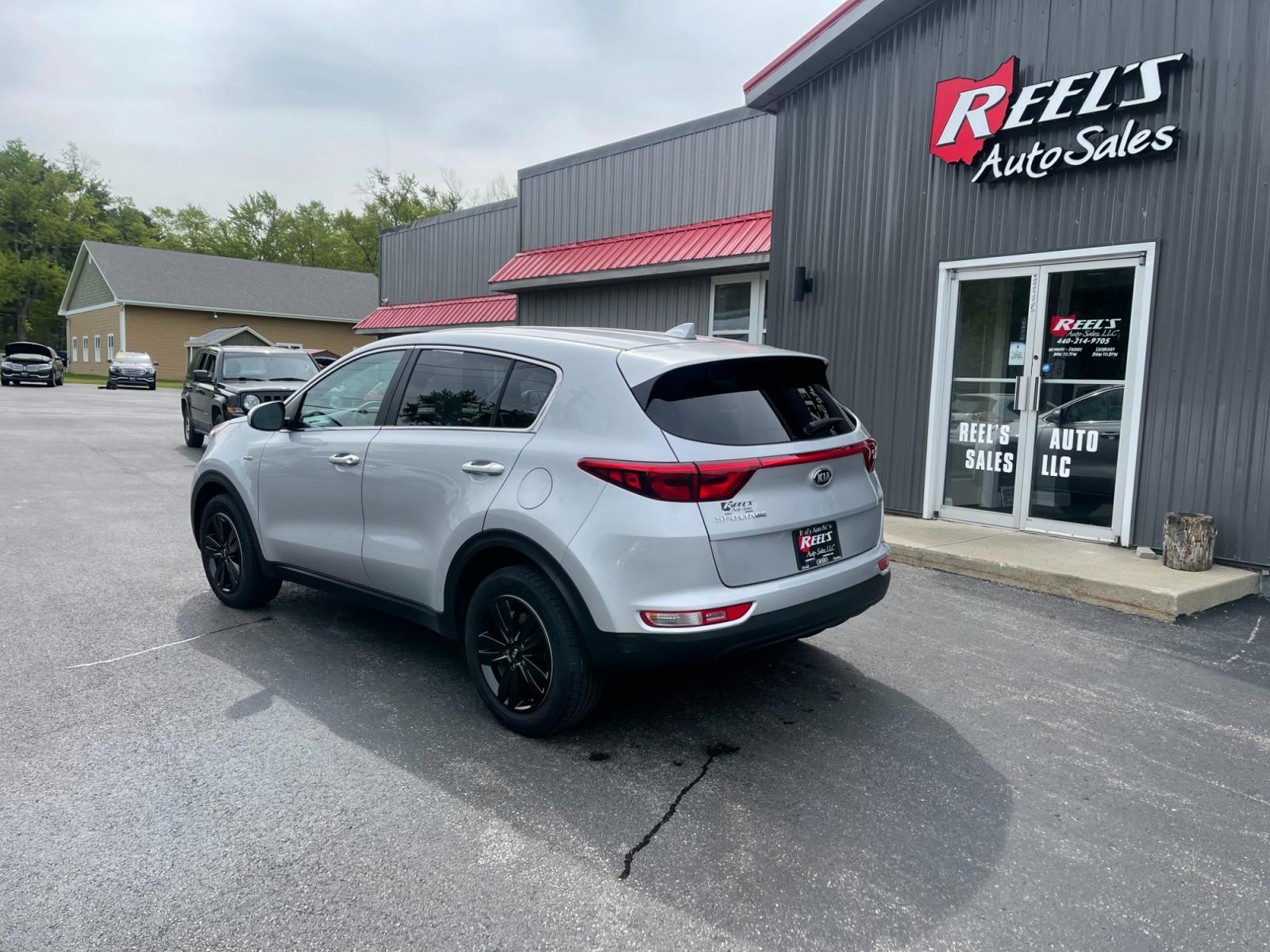 2018 Silver /Black Kia Sportage LX AWD (KNDPMCAC8J7) with an 2.4L I4 DOHC 24V engine, 6A transmission, located at 547 E. Main St., Orwell, OH, 44076, (440) 437-5893, 41.535435, -80.847855 - 2018 Kia Sportage LX AWD ---- Only 64K Miles ---- Heated Seats ---- 23 MPG Combined ---- Fully Serviced and Recently Detailed ---- Reel's Auto Sales is located in both Chardon and Orwell Ohio. Financing available and trades welcome. Please call or text to confirm location, set an appointment or disc - Photo #11
