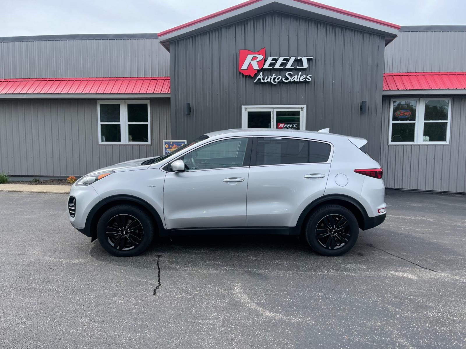 2018 Silver /Black Kia Sportage LX AWD (KNDPMCAC8J7) with an 2.4L I4 DOHC 24V engine, 6A transmission, located at 547 E. Main St., Orwell, OH, 44076, (440) 437-5893, 41.535435, -80.847855 - 2018 Kia Sportage LX AWD ---- Only 64K Miles ---- Heated Seats ---- 23 MPG Combined ---- Fully Serviced and Recently Detailed ---- Reel's Auto Sales is located in both Chardon and Orwell Ohio. Financing available and trades welcome. Please call or text to confirm location, set an appointment or disc - Photo #14