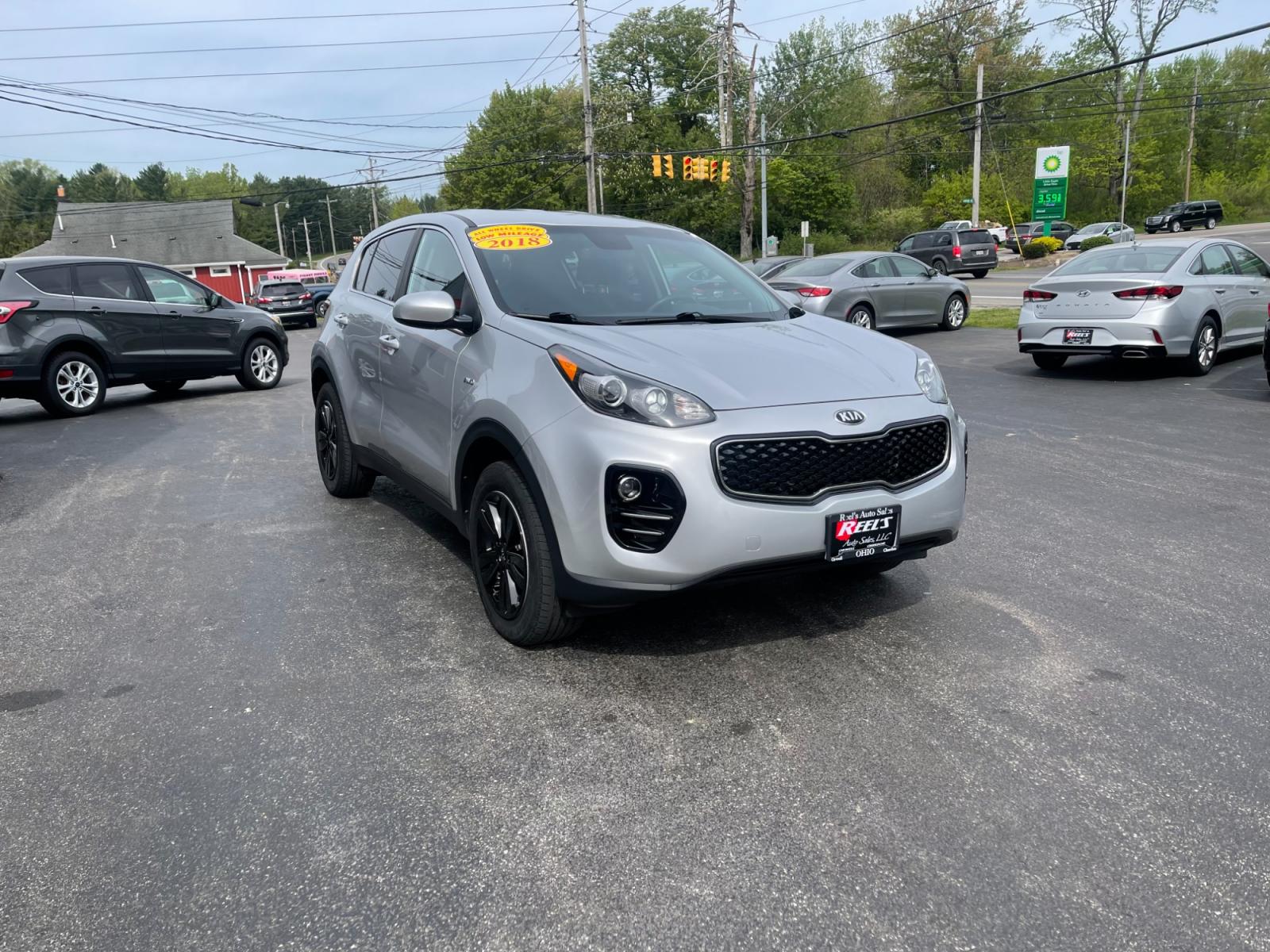 2018 Silver /Black Kia Sportage LX AWD (KNDPMCAC8J7) with an 2.4L I4 DOHC 24V engine, 6A transmission, located at 547 E. Main St., Orwell, OH, 44076, (440) 437-5893, 41.535435, -80.847855 - 2018 Kia Sportage LX AWD ---- Only 64K Miles ---- Heated Seats ---- 23 MPG Combined ---- Fully Serviced and Recently Detailed ---- Reel's Auto Sales is located in both Chardon and Orwell Ohio. Financing available and trades welcome. Please call or text to confirm location, set an appointment or disc - Photo #2