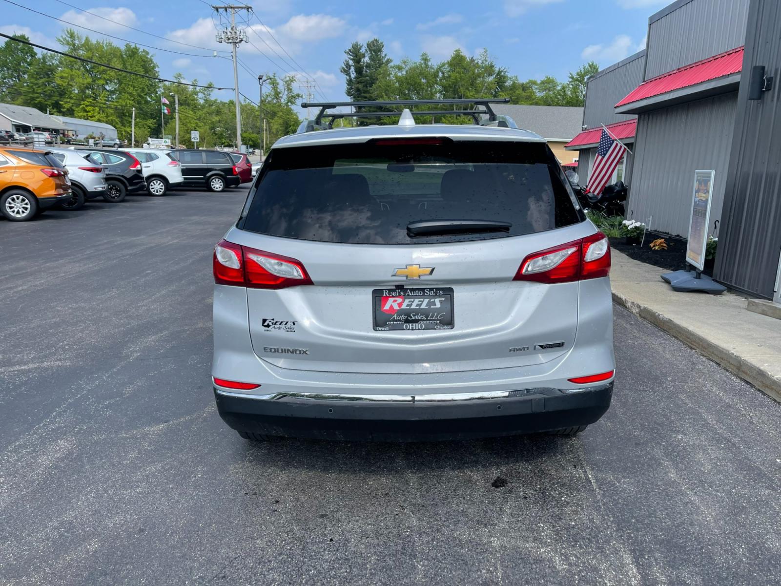 2018 Silver /Black Chevrolet Equinox Premier AWD (2GNAXVEV1J6) with an 1.5L I4 DIR DOHC 16V TURBO engine, 6A transmission, located at 547 E. Main St., Orwell, OH, 44076, (440) 437-5893, 41.535435, -80.847855 - 2018 Chevrolet Equinox Premier AWD ---- Heated And Cooled Seats ---- Heated Rear Seats ---- All Wheel Drive ---- 26 MPG Combined ---- Fully Serviced and Recently Detailed ---- Reel's Auto Sales is located in both Chardon and Orwell Ohio. Financing available and trades welcome. Please call or text to - Photo #8