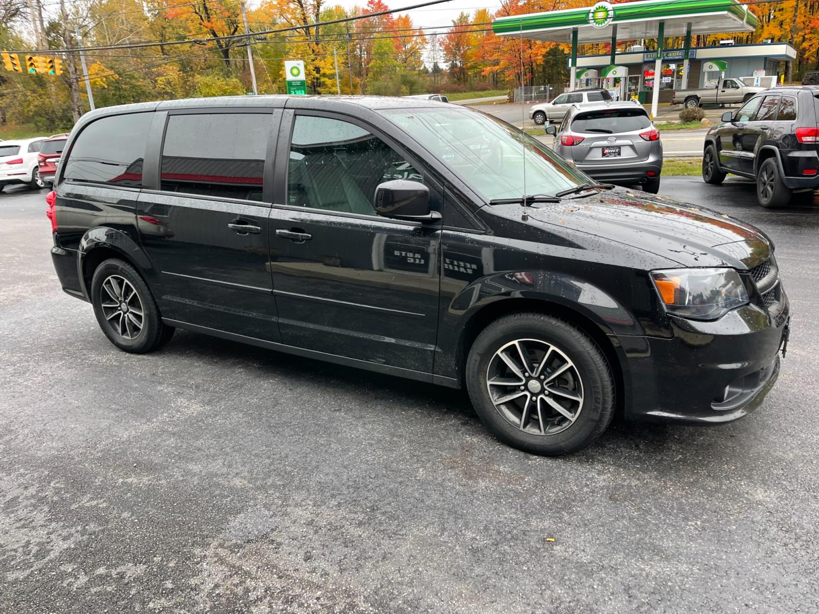 2016 Black /Black Dodge Grand Caravan R/T (2C4RDGEG5GR) with an 3.6L V6 DOHC 24V FFV engine, 6A transmission, located at 547 E. Main St., Orwell, OH, 44076, (440) 437-5893, 41.535435, -80.847855 - This 2016 Dodge Grand Caravan R/T boasts a one-owner history and is loaded with features for comfort and entertainment. A rear entertainment system keeps passengers occupied, while heated front and rear seats keep everyone cozy. The 9-speaker sound system fills the cabin with high-quality audio. Wit - Photo #3