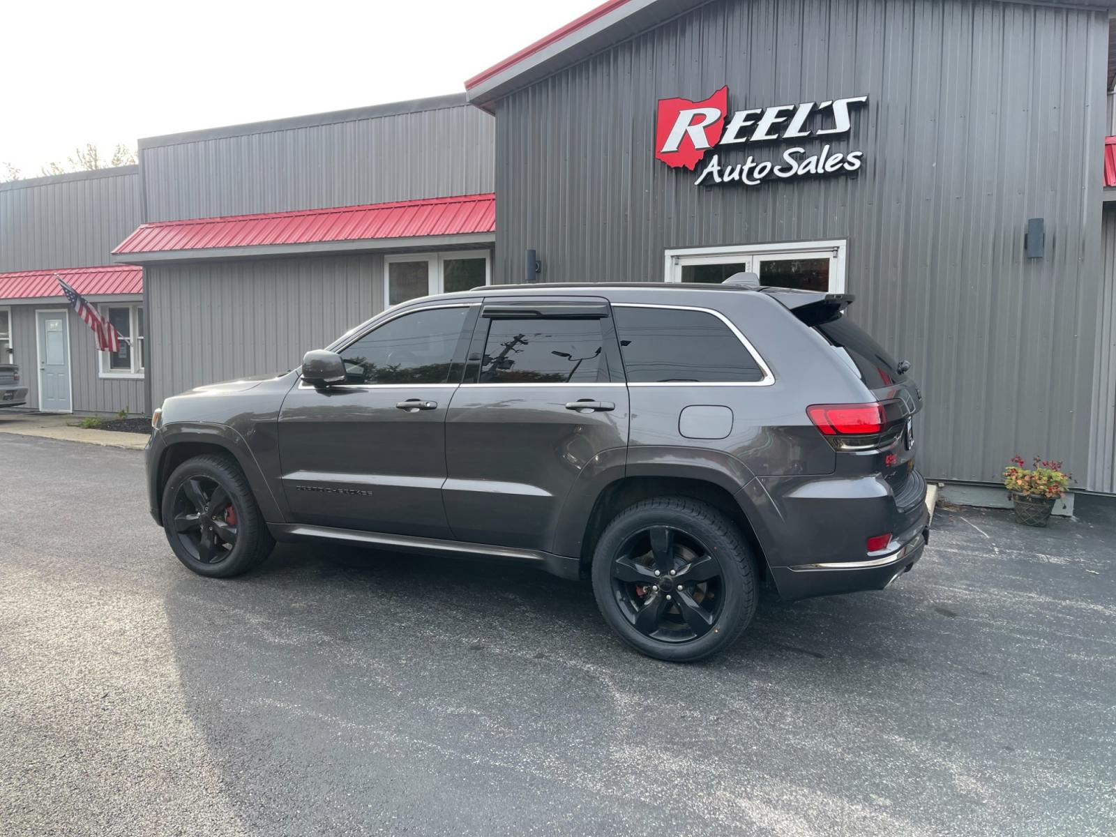2015 Gray /Black Jeep Grand Cherokee High Altitude 4WD (1C4RJFCTXFC) with an 5.7L V8 OHV 16V engine, 8-Speed Automatic transmission, located at 11115 Chardon Rd. , Chardon, OH, 44024, (440) 214-9705, 41.580246, -81.241943 - This 2015 Jeep Grand Cherokee High Altitude 4WD comes equipped with a powerful 5.7 V8 engine and a 19 speaker Harmon Kardon sound system, making it a top-of-the-line SUV. This model also features 4-wheel drive for enhanced traction and off-road capabilities. With its spacious interior, luxury amenit - Photo #12