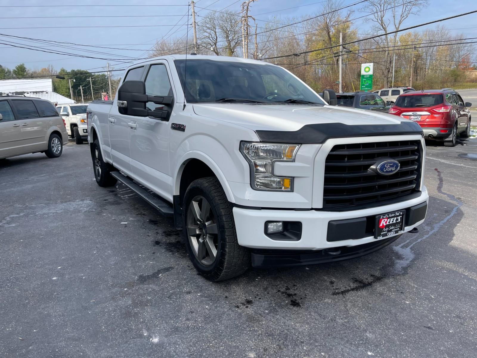 2017 White /Black Ford F-150 XLT SuperCrew 6.5-ft. Bed 4WD (1FTFW1EF2HF) with an 5.0L V8 engine, 6A transmission, located at 11115 Chardon Rd. , Chardon, OH, 44024, (440) 214-9705, 41.580246, -81.241943 - This 2017 Ford F-150 XLT Crew Cab is a powerful and spacious vehicle with a 5.0-liter V8 engine that produces 385 horsepower. The Sport Package gives the truck an athletic appearance with its 20-inch wheels, black grille, and body-colored bumpers. The 302A Package adds features such as power-adjusta - Photo #2
