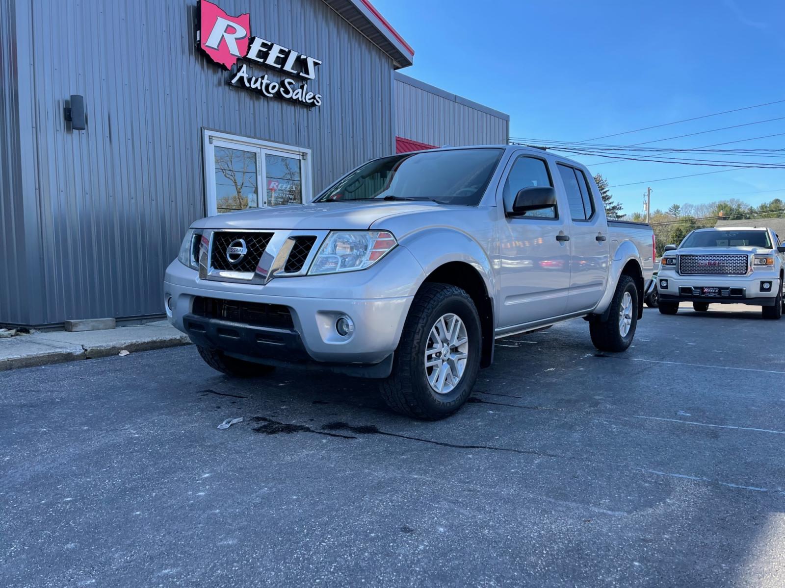 2014 Silver /Gray Nissan Frontier SV Crew Cab 4WD (1N6AD0EVXEN) with an 4.0L V6 DOHC 24V engine, 5-Speed Automatic transmission, located at 11115 Chardon Rd. , Chardon, OH, 44024, (440) 214-9705, 41.580246, -81.241943 - Photo #0