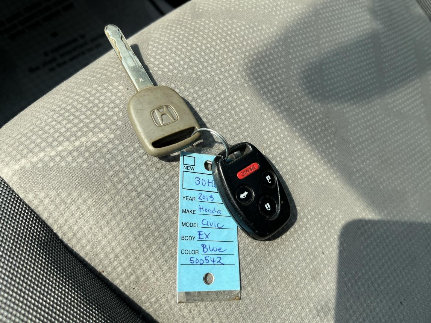 2013 Blue /Gray Honda Civic EX Coupe 5-Speed AT (2HGFG3B87DH) with an 1.8L I4 SOHC 16V engine, Automatic transmission, located at 11115 Chardon Rd. , Chardon, OH, 44024, (440) 214-9705, 41.580246, -81.241943- Photo#22
