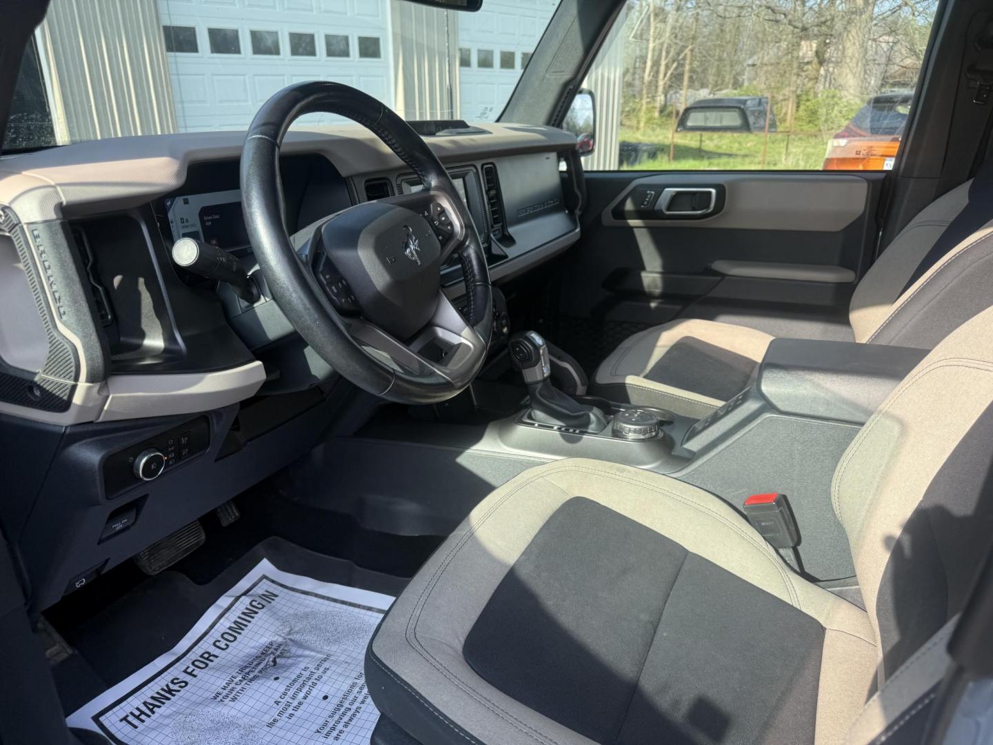 2023 Blue /Tan Ford Bronco Big Bend 4-Door (1FMEE5BP3PL) with an 2.7L V6 DOHC 24V TWIN TURBO engine, Automatic transmission, located at 547 E. Main St., Orwell, OH, 44076, (440) 437-5893, 41.535435, -80.847855 - 2023 Ford Bronco Big Bend – Adventure-Ready with 2.7L Twin-Turbo Power and Fresh Off-Road Tires! This 2023 Ford Bronco Big Bend is a clean, capable 4-door ready to take on trails, sand, snow, or daily drives! Powered by the strong 2.7L Twin-Turbo EcoBoost V6 engine paired with a smooth 10-speed a - Photo#8