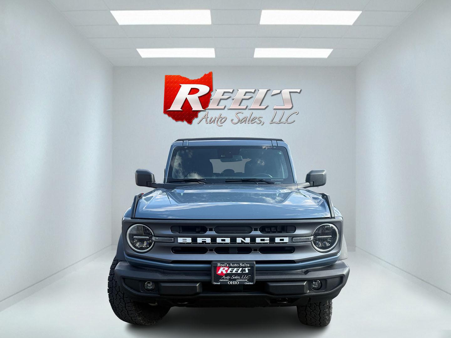 2023 Blue /Tan Ford Bronco Big Bend 4-Door (1FMEE5BP3PL) with an 2.7L V6 DOHC 24V TWIN TURBO engine, Automatic transmission, located at 547 E. Main St., Orwell, OH, 44076, (440) 437-5893, 41.535435, -80.847855 - 2023 Ford Bronco Big Bend – Adventure-Ready with 2.7L Twin-Turbo Power and Fresh Off-Road Tires! This 2023 Ford Bronco Big Bend is a clean, capable 4-door ready to take on trails, sand, snow, or daily drives! Powered by the strong 2.7L Twin-Turbo EcoBoost V6 engine paired with a smooth 10-speed a - Photo#1