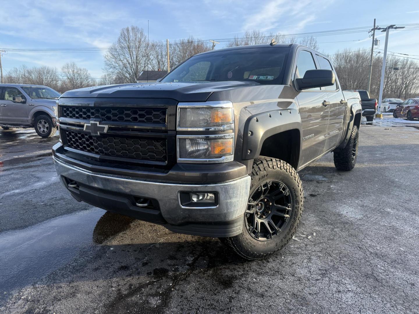 2014 Gray /Black Chevrolet Silverado 1500 LT Crew Cab 4WD (3GCUKREC7EG) with an 5.3L V8 OHV 16V engine, Automatic transmission, located at 547 E. Main St., Orwell, OH, 44076, (440) 437-5893, 41.535435, -80.847855 - 2014 Chevrolet Silverado 1500 LT Crew Cab 4WD – Full-Size Muscle, Serious Towing Power, and Ready for the Whole Crew! This tough 2014 Chevrolet Silverado 1500 LT Crew Cab 4WD is built to dominate work sites, trails, and highways! The proven 5.3L EcoTec3 V8 engine roars through a smooth 6-speed au - Photo#0