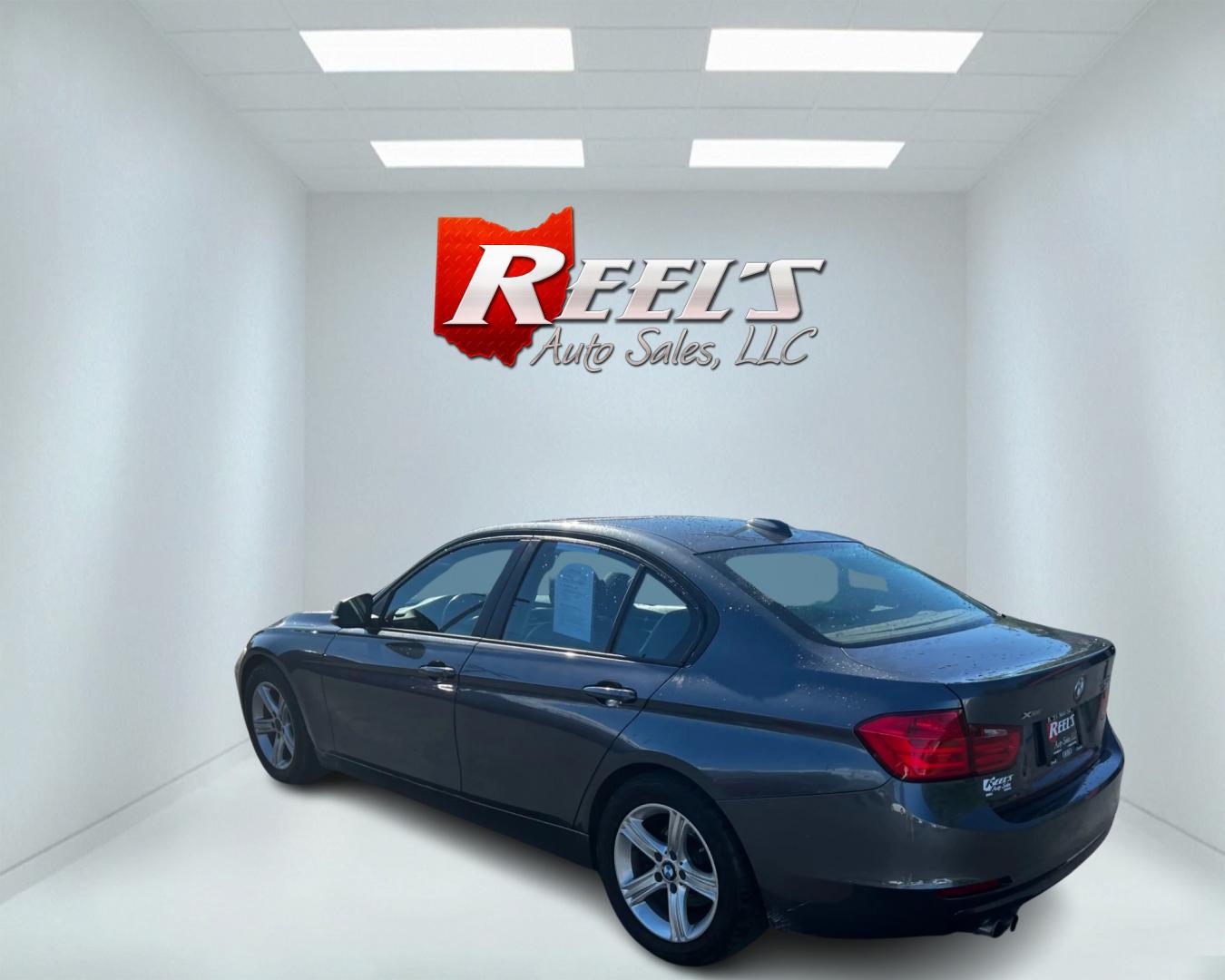 2014 Gray /Black BMW 3-Series 328i xDrive Sedan (WBA3B5C54EP) with an 2.0L I4 DOHC 16V Turbo engine, 8-Speed Automatic transmission, located at 11115 Chardon Rd. , Chardon, OH, 44024, (440) 214-9705, 41.580246, -81.241943 - This 2014 BMW 328i XDrive Sedan combines performance and luxury with its 2.0 turbocharged engine delivering 240 HP, an 8-speed automatic transmission, and all-wheel drive, achieving 0-60 mph in 5.7 seconds and 32 MPG on the highway. It offers premium features such as dusk sensing headlights, leather - Photo#7