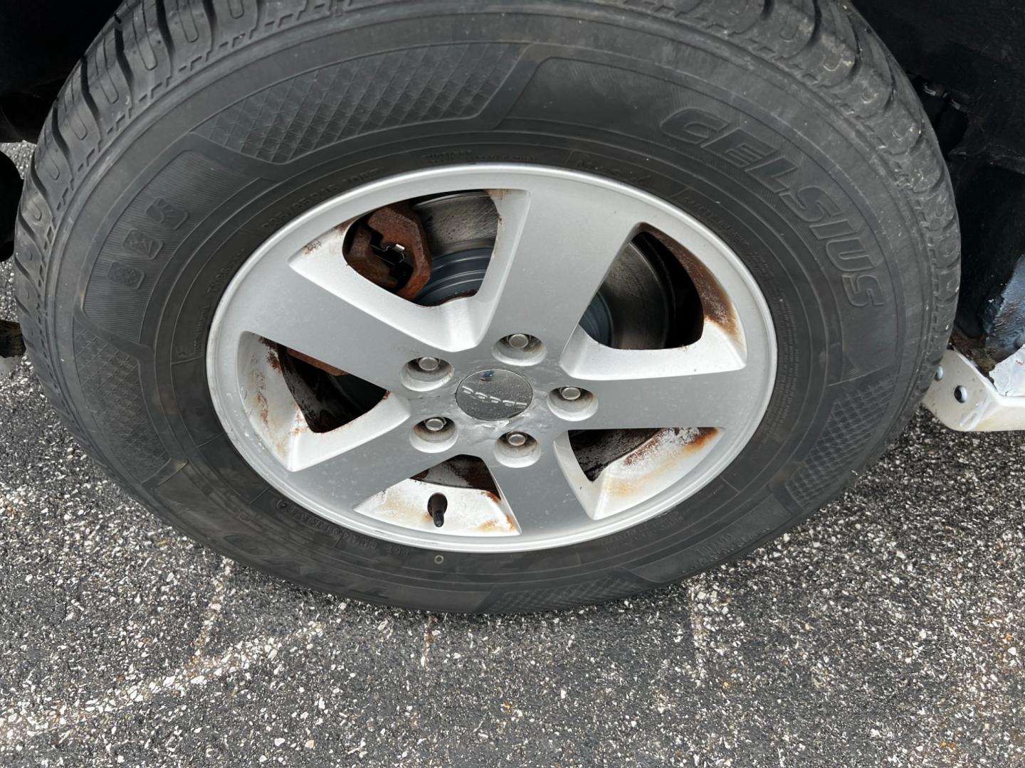 2011 White /Black Dodge Grand Caravan Mainstreet (2D4RN3DG9BR) with an 3.6L V6 DOHC 24V FFV engine, 6-Speed Automatic transmission, located at 547 E. Main St., Orwell, OH, 44076, (440) 437-5893, 41.535435, -80.847855 - Photo#11
