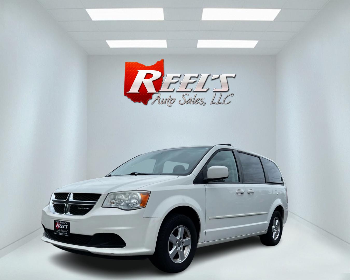 2011 White /Black Dodge Grand Caravan Mainstreet (2D4RN3DG9BR) with an 3.6L V6 DOHC 24V FFV engine, 6-Speed Automatic transmission, located at 547 E. Main St., Orwell, OH, 44076, (440) 437-5893, 41.535435, -80.847855 - Photo#0