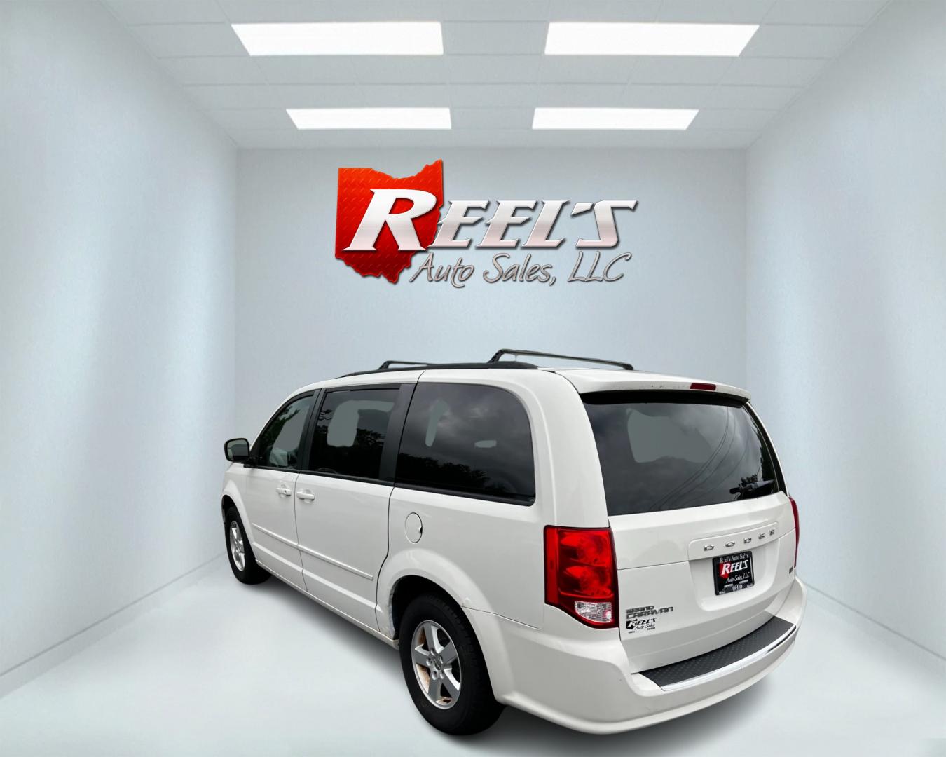 2011 White /Black Dodge Grand Caravan Mainstreet (2D4RN3DG9BR) with an 3.6L V6 DOHC 24V FFV engine, 6-Speed Automatic transmission, located at 547 E. Main St., Orwell, OH, 44076, (440) 437-5893, 41.535435, -80.847855 - Photo#7