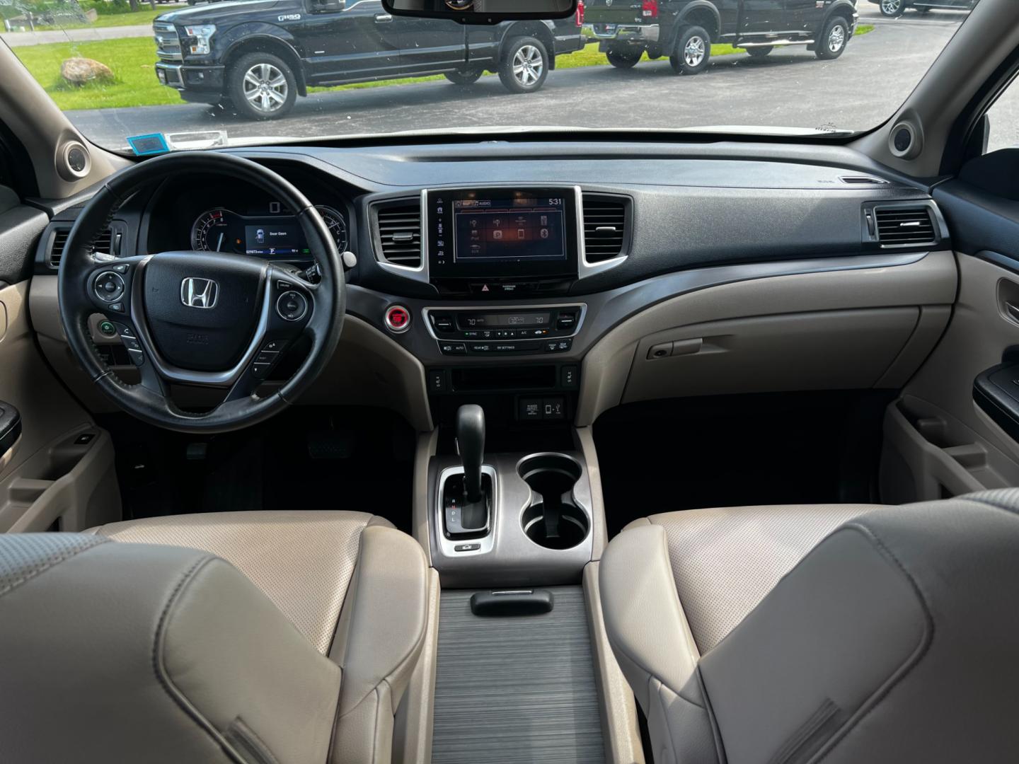 2017 White /Tan Honda Ridgeline RTL-T AWD (5FPYK3F61HB) with an 3.5L V6 SOHC 24V engine, 6-Speed Automatic transmission, located at 11115 Chardon Rd. , Chardon, OH, 44024, (440) 214-9705, 41.580246, -81.241943 - Photo#45
