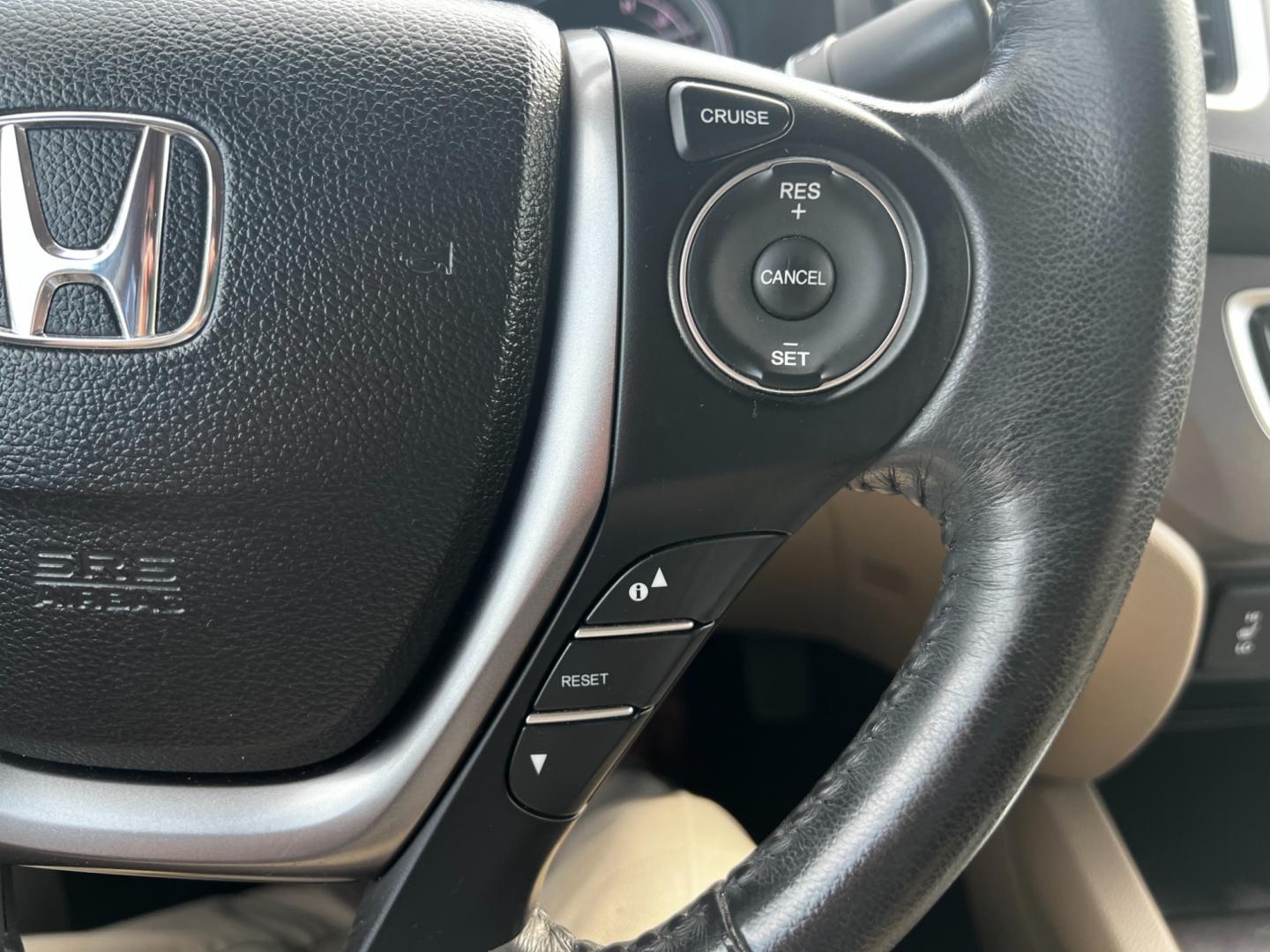 2017 White /Tan Honda Ridgeline RTL-T AWD (5FPYK3F61HB) with an 3.5L V6 SOHC 24V engine, 6-Speed Automatic transmission, located at 11115 Chardon Rd. , Chardon, OH, 44024, (440) 214-9705, 41.580246, -81.241943 - Photo#31