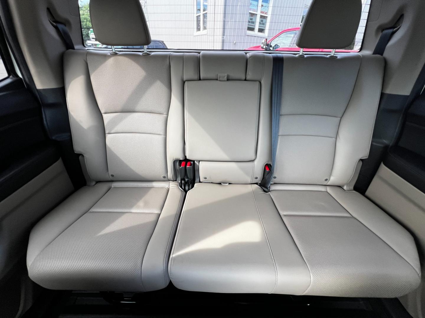 2017 White /Tan Honda Ridgeline RTL-T AWD (5FPYK3F61HB) with an 3.5L V6 SOHC 24V engine, 6-Speed Automatic transmission, located at 11115 Chardon Rd. , Chardon, OH, 44024, (440) 214-9705, 41.580246, -81.241943 - Photo#40