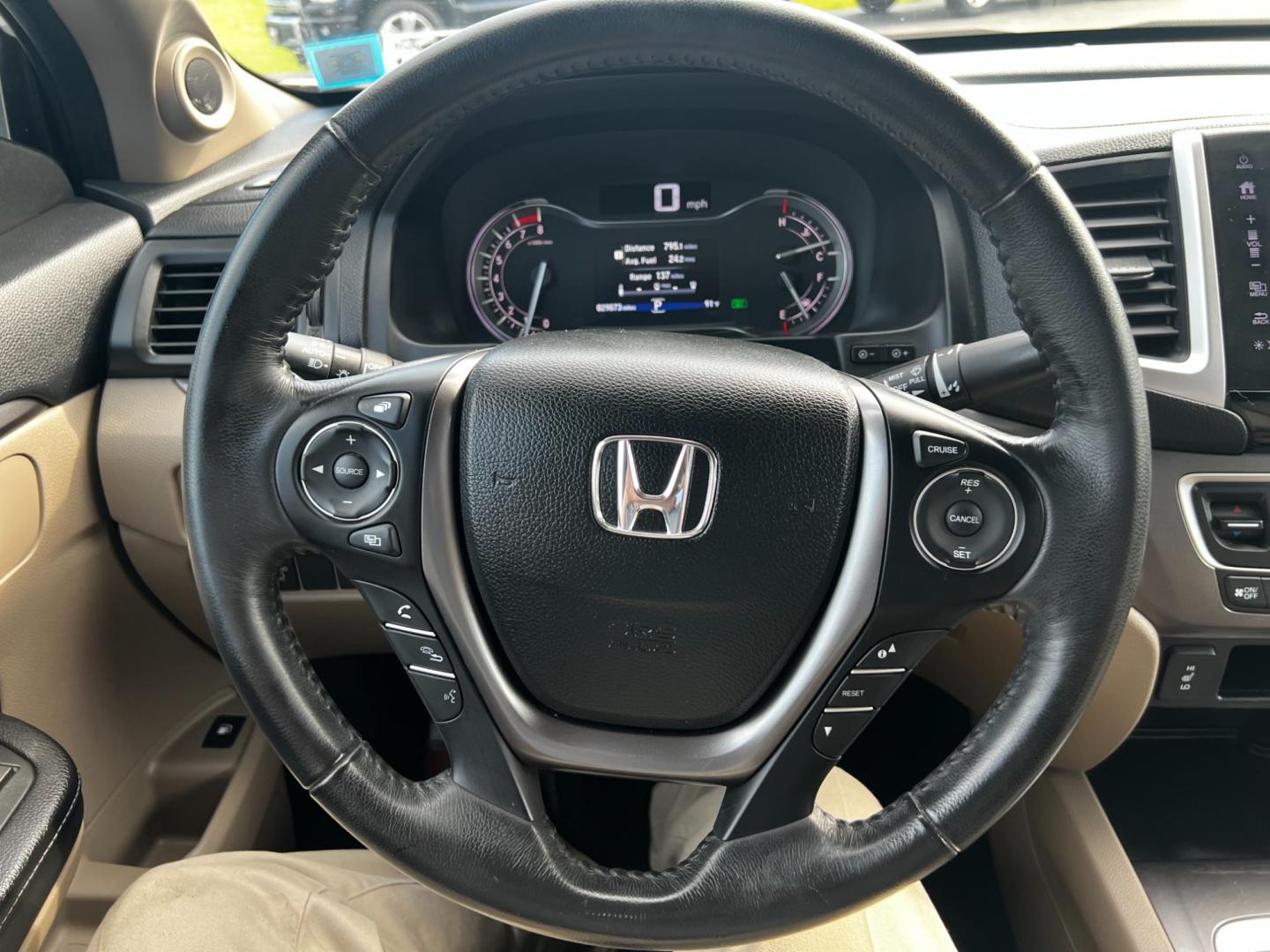 2017 White /Tan Honda Ridgeline RTL-T AWD (5FPYK3F61HB) with an 3.5L V6 SOHC 24V engine, 6-Speed Automatic transmission, located at 11115 Chardon Rd. , Chardon, OH, 44024, (440) 214-9705, 41.580246, -81.241943 - Photo#32