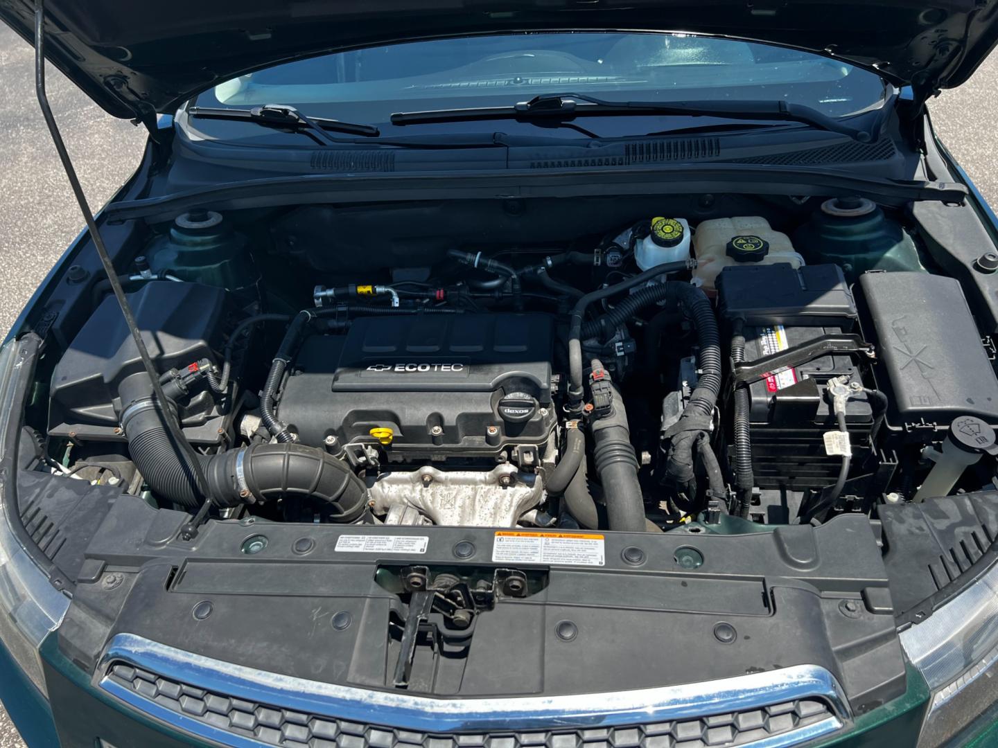 2014 Green /Black Chevrolet Cruze 1LT Auto (1G1PC5SB2E7) with an 1.4L I4 DOHC 16V TURBO engine, 6-Speed Automatic transmission, located at 11115 Chardon Rd. , Chardon, OH, 44024, (440) 214-9705, 41.580246, -81.241943 - Photo#13