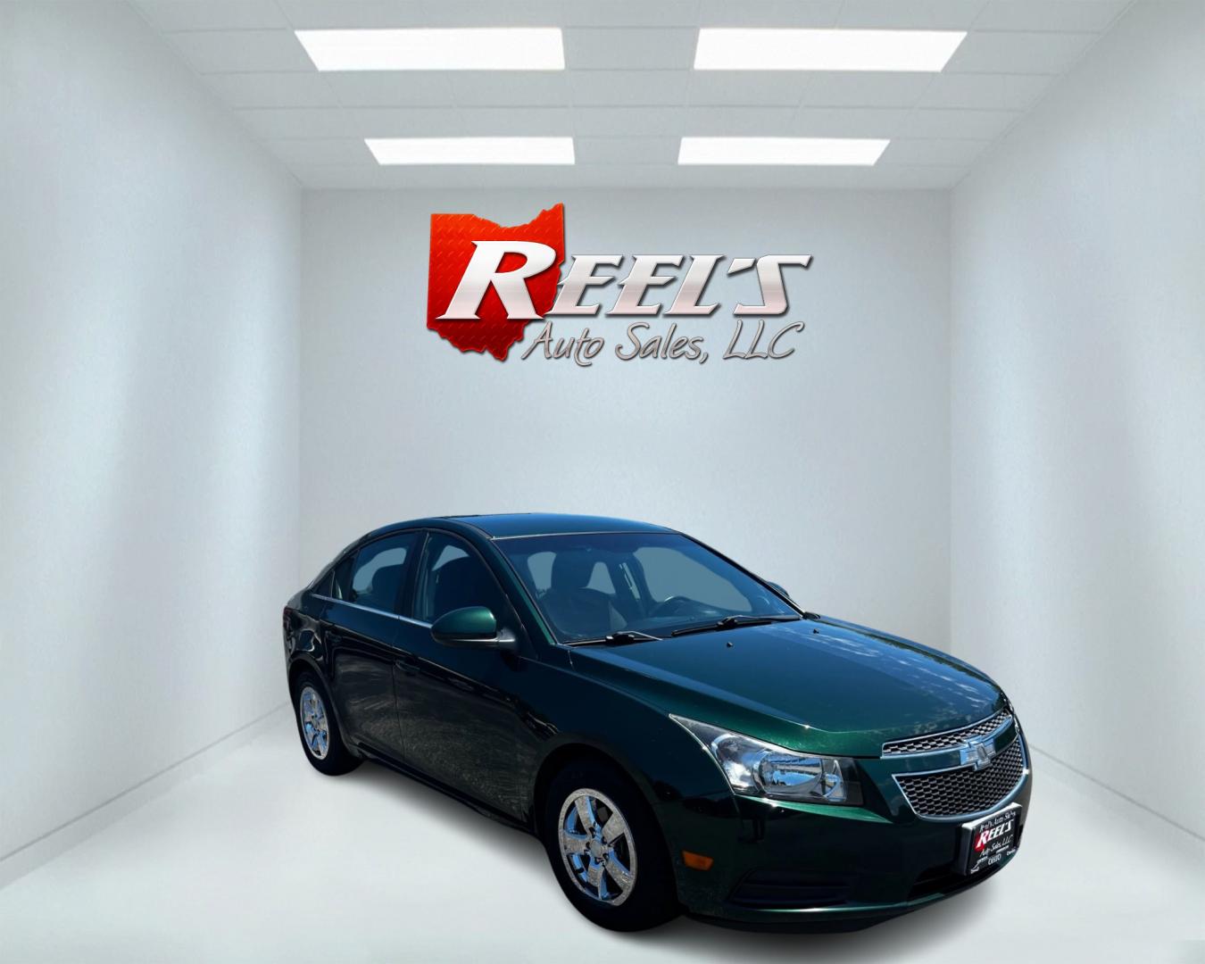 2014 Green /Black Chevrolet Cruze 1LT Auto (1G1PC5SB2E7) with an 1.4L I4 DOHC 16V TURBO engine, 6-Speed Automatic transmission, located at 11115 Chardon Rd. , Chardon, OH, 44024, (440) 214-9705, 41.580246, -81.241943 - Photo#2