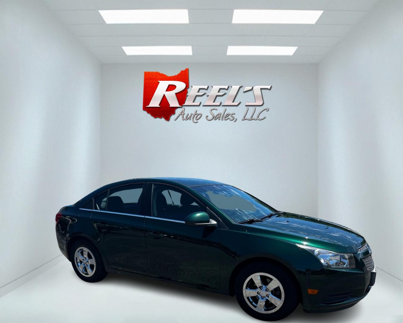 2014 Green /Black Chevrolet Cruze 1LT Auto (1G1PC5SB2E7) with an 1.4L I4 DOHC 16V TURBO engine, 6-Speed Automatic transmission, located at 11115 Chardon Rd. , Chardon, OH, 44024, (440) 214-9705, 41.580246, -81.241943 - Photo#3