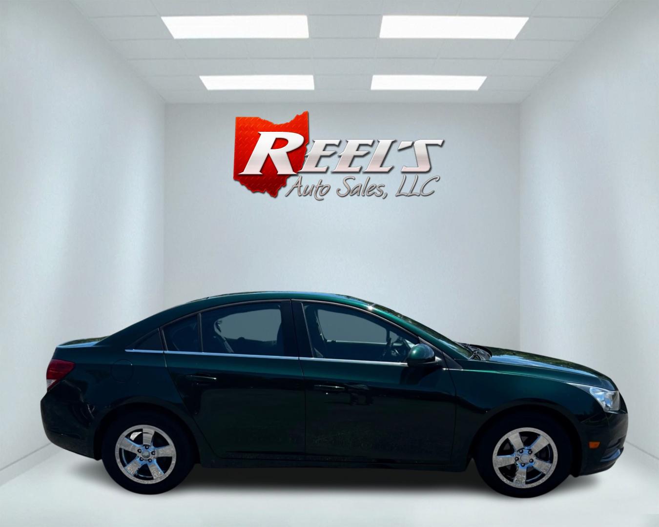 2014 Green /Black Chevrolet Cruze 1LT Auto (1G1PC5SB2E7) with an 1.4L I4 DOHC 16V TURBO engine, 6-Speed Automatic transmission, located at 11115 Chardon Rd. , Chardon, OH, 44024, (440) 214-9705, 41.580246, -81.241943 - Photo#4