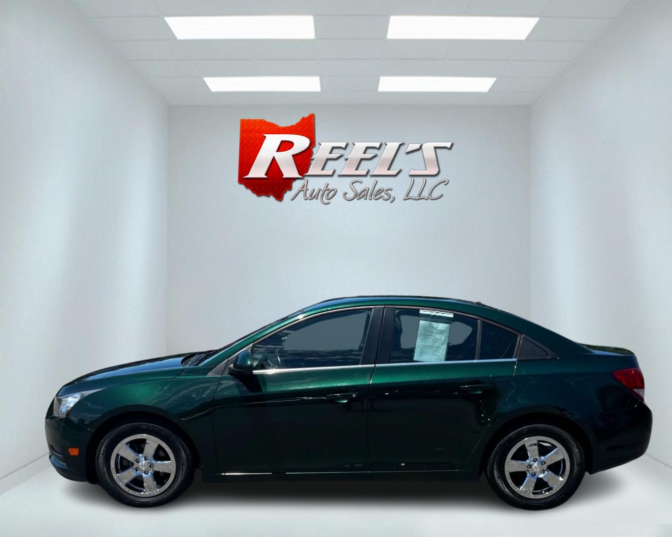2014 Green /Black Chevrolet Cruze 1LT Auto (1G1PC5SB2E7) with an 1.4L I4 DOHC 16V TURBO engine, 6-Speed Automatic transmission, located at 11115 Chardon Rd. , Chardon, OH, 44024, (440) 214-9705, 41.580246, -81.241943 - Photo#9
