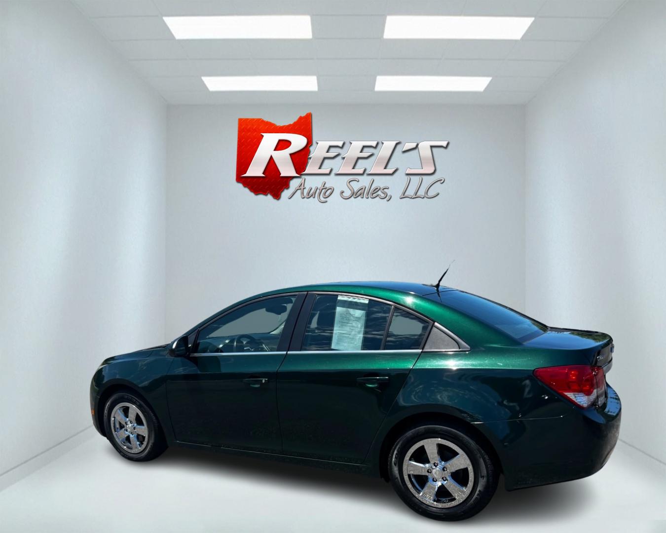 2014 Green /Black Chevrolet Cruze 1LT Auto (1G1PC5SB2E7) with an 1.4L I4 DOHC 16V TURBO engine, 6-Speed Automatic transmission, located at 11115 Chardon Rd. , Chardon, OH, 44024, (440) 214-9705, 41.580246, -81.241943 - Photo#8