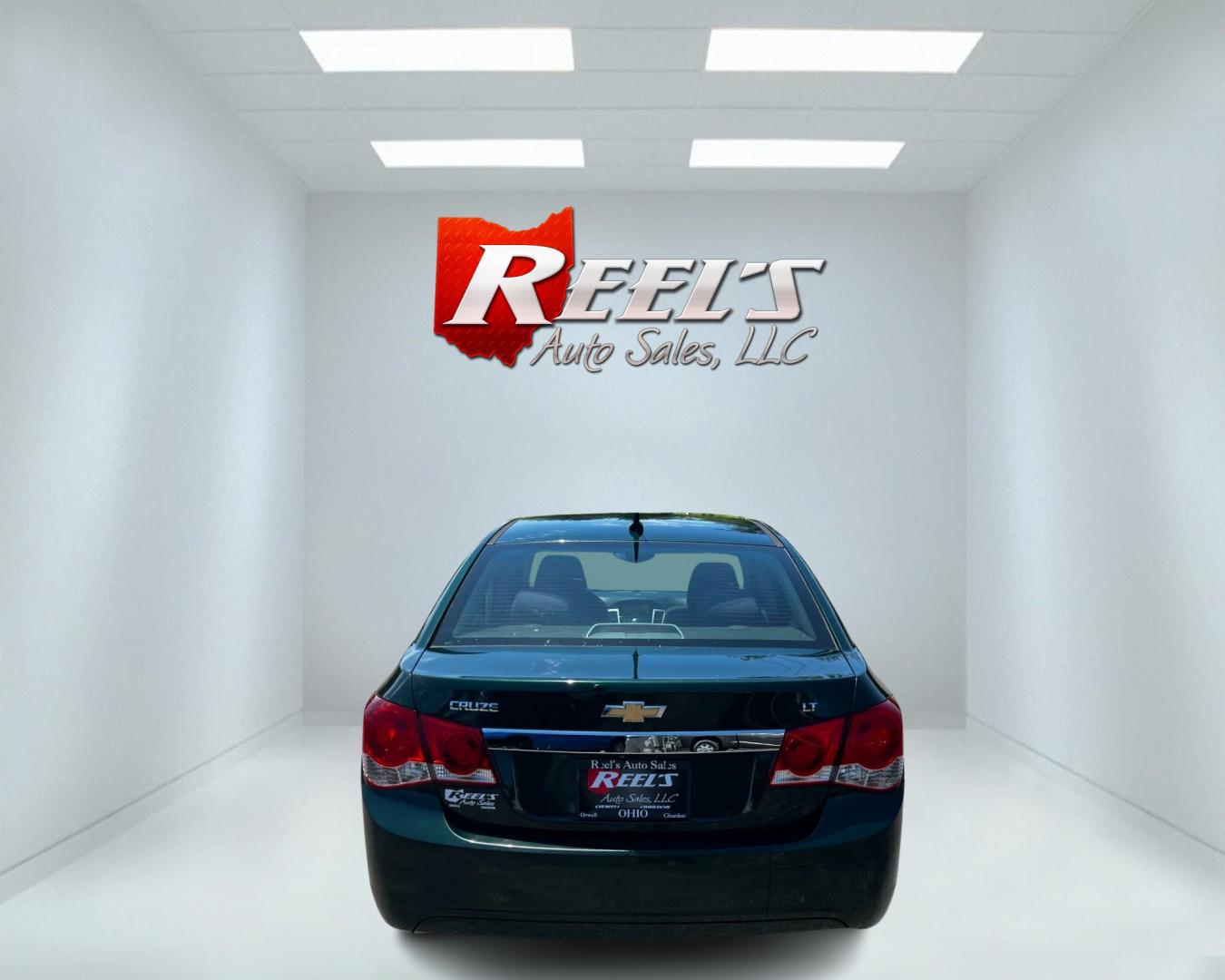 2014 Green /Black Chevrolet Cruze 1LT Auto (1G1PC5SB2E7) with an 1.4L I4 DOHC 16V TURBO engine, 6-Speed Automatic transmission, located at 11115 Chardon Rd. , Chardon, OH, 44024, (440) 214-9705, 41.580246, -81.241943 - Photo#6