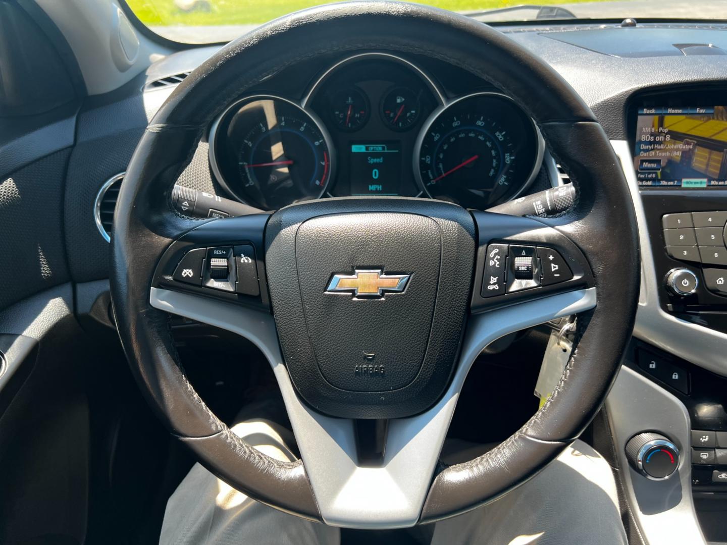 2014 Green /Black Chevrolet Cruze 1LT Auto (1G1PC5SB2E7) with an 1.4L I4 DOHC 16V TURBO engine, 6-Speed Automatic transmission, located at 11115 Chardon Rd. , Chardon, OH, 44024, (440) 214-9705, 41.580246, -81.241943 - Photo#22