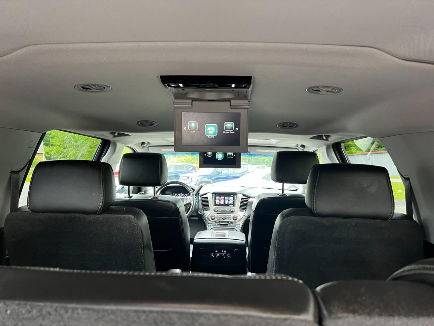 2018 Black /Black GMC Yukon XL Denali 4WD (1GKS2HKJ0JR) with an 6.2L V8 OHV 16V engine, 10 Speed Auto transmission, located at 547 E. Main St., Orwell, OH, 44076, (440) 437-5893, 41.535435, -80.847855 - This 2018 GMC Yukon XL Denali 4WD, powered by a robust 6.2 V8 engine with a 10-speed automatic transmission delivering 420 HP, is a powerful and luxurious full-size SUV. With a 7,900-pound towing capacity, it is well-suited for heavy-duty tasks. The HID headlights, LED daytime running lights, and ra - Photo#45