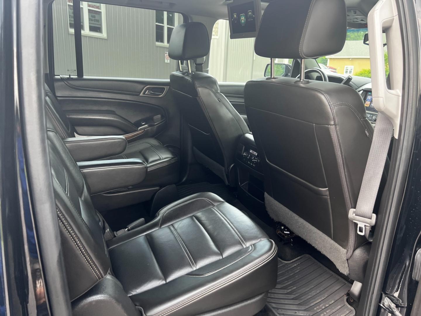 2018 Black /Black GMC Yukon XL Denali 4WD (1GKS2HKJ0JR) with an 6.2L V8 OHV 16V engine, 10 Speed Auto transmission, located at 547 E. Main St., Orwell, OH, 44076, (440) 437-5893, 41.535435, -80.847855 - This 2018 GMC Yukon XL Denali 4WD, powered by a robust 6.2 V8 engine with a 10-speed automatic transmission delivering 420 HP, is a powerful and luxurious full-size SUV. With a 7,900-pound towing capacity, it is well-suited for heavy-duty tasks. The HID headlights, LED daytime running lights, and ra - Photo#47