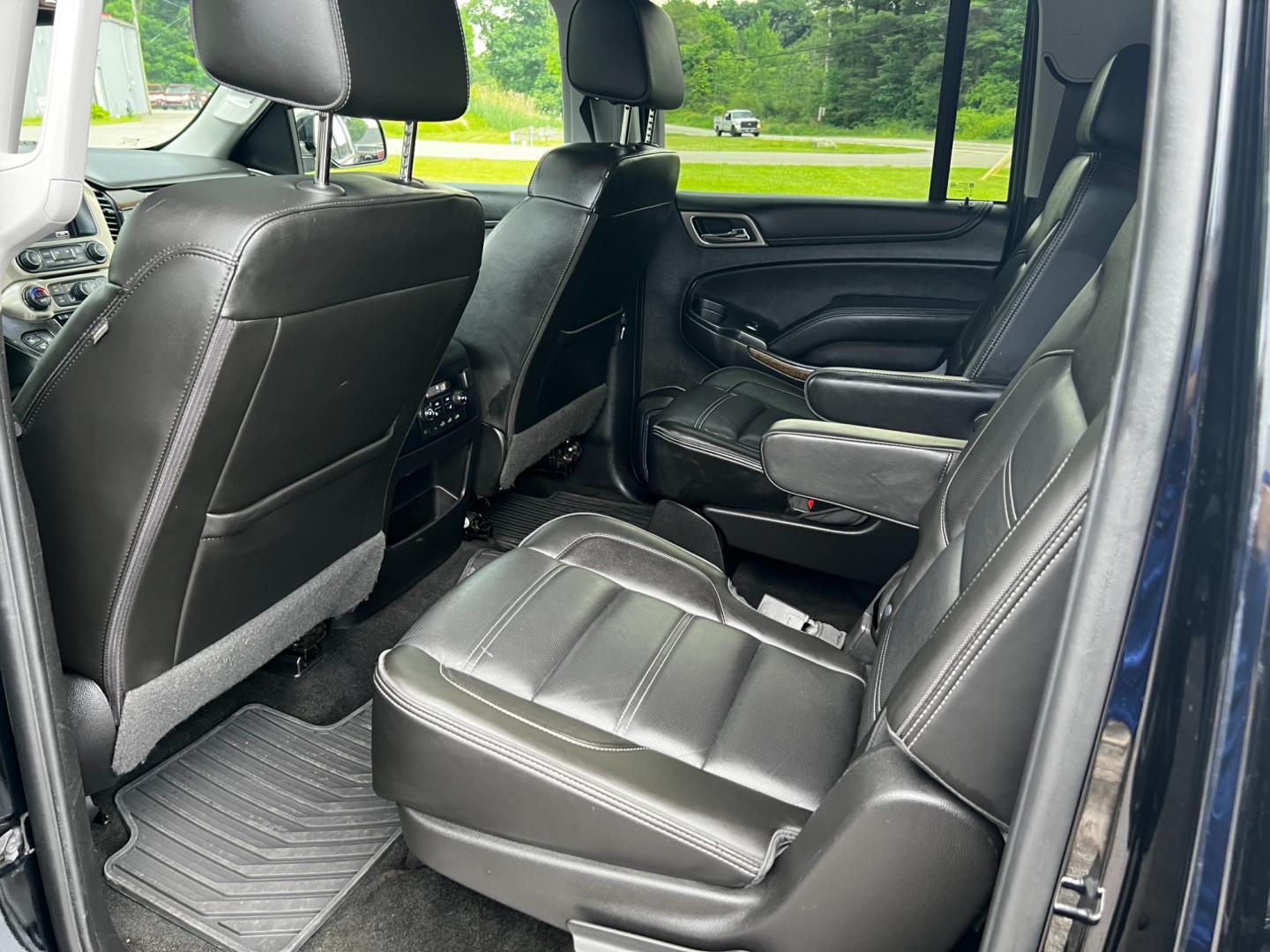 2018 Black /Black GMC Yukon XL Denali 4WD (1GKS2HKJ0JR) with an 6.2L V8 OHV 16V engine, 10 Speed Auto transmission, located at 547 E. Main St., Orwell, OH, 44076, (440) 437-5893, 41.535435, -80.847855 - This 2018 GMC Yukon XL Denali 4WD, powered by a robust 6.2 V8 engine with a 10-speed automatic transmission delivering 420 HP, is a powerful and luxurious full-size SUV. With a 7,900-pound towing capacity, it is well-suited for heavy-duty tasks. The HID headlights, LED daytime running lights, and ra - Photo#39