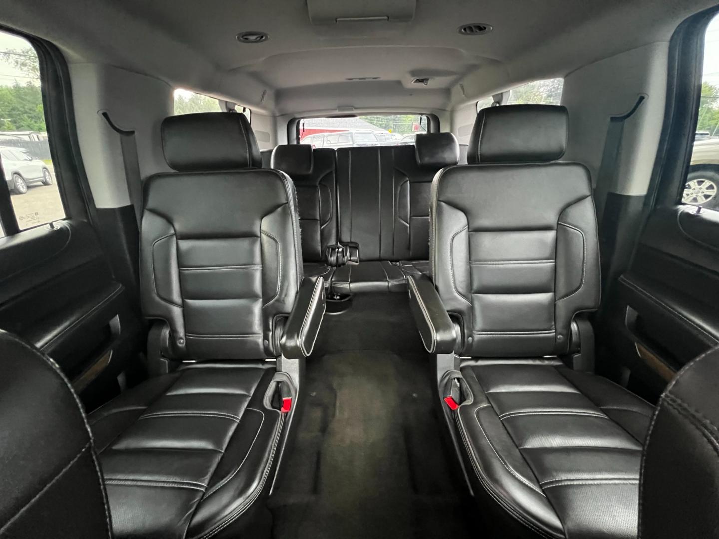 2018 Black /Black GMC Yukon XL Denali 4WD (1GKS2HKJ0JR) with an 6.2L V8 OHV 16V engine, 10 Speed Auto transmission, located at 547 E. Main St., Orwell, OH, 44076, (440) 437-5893, 41.535435, -80.847855 - This 2018 GMC Yukon XL Denali 4WD, powered by a robust 6.2 V8 engine with a 10-speed automatic transmission delivering 420 HP, is a powerful and luxurious full-size SUV. With a 7,900-pound towing capacity, it is well-suited for heavy-duty tasks. The HID headlights, LED daytime running lights, and ra - Photo#38