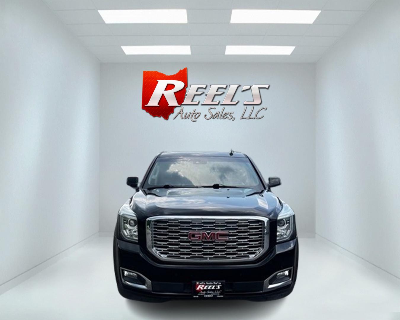 2018 Black /Black GMC Yukon XL Denali 4WD (1GKS2HKJ0JR) with an 6.2L V8 OHV 16V engine, 10 Speed Auto transmission, located at 547 E. Main St., Orwell, OH, 44076, (440) 437-5893, 41.535435, -80.847855 - This 2018 GMC Yukon XL Denali 4WD, powered by a robust 6.2 V8 engine with a 10-speed automatic transmission delivering 420 HP, is a powerful and luxurious full-size SUV. With a 7,900-pound towing capacity, it is well-suited for heavy-duty tasks. The HID headlights, LED daytime running lights, and ra - Photo#1