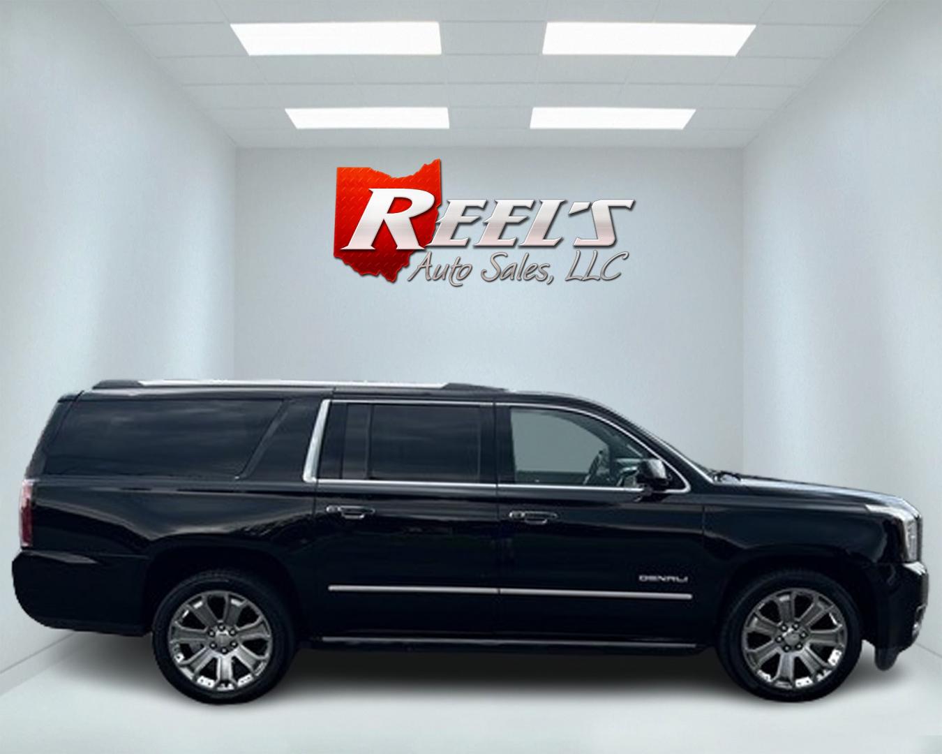 2018 Black /Black GMC Yukon XL Denali 4WD (1GKS2HKJ0JR) with an 6.2L V8 OHV 16V engine, 10 Speed Auto transmission, located at 547 E. Main St., Orwell, OH, 44076, (440) 437-5893, 41.535435, -80.847855 - This 2018 GMC Yukon XL Denali 4WD, powered by a robust 6.2 V8 engine with a 10-speed automatic transmission delivering 420 HP, is a powerful and luxurious full-size SUV. With a 7,900-pound towing capacity, it is well-suited for heavy-duty tasks. The HID headlights, LED daytime running lights, and ra - Photo#3