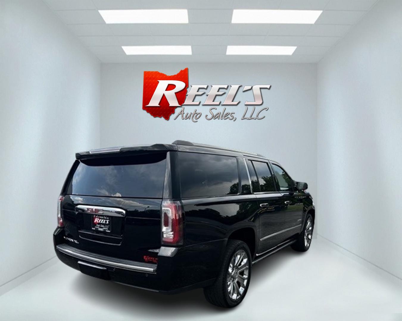 2018 Black /Black GMC Yukon XL Denali 4WD (1GKS2HKJ0JR) with an 6.2L V8 OHV 16V engine, 10 Speed Auto transmission, located at 547 E. Main St., Orwell, OH, 44076, (440) 437-5893, 41.535435, -80.847855 - This 2018 GMC Yukon XL Denali 4WD, powered by a robust 6.2 V8 engine with a 10-speed automatic transmission delivering 420 HP, is a powerful and luxurious full-size SUV. With a 7,900-pound towing capacity, it is well-suited for heavy-duty tasks. The HID headlights, LED daytime running lights, and ra - Photo#4