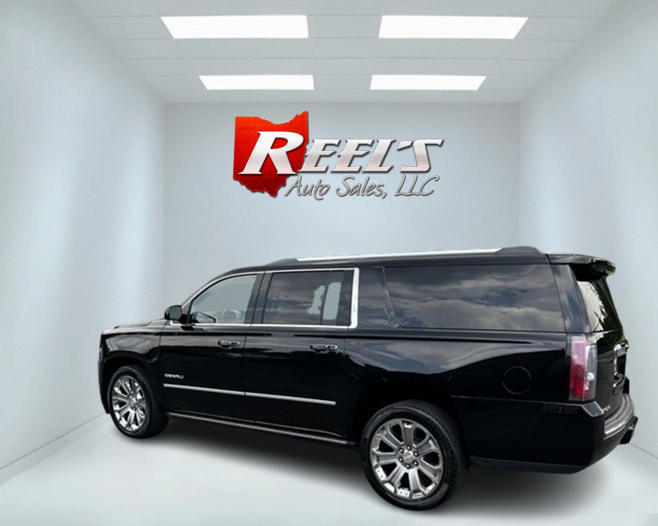 2018 Black /Black GMC Yukon XL Denali 4WD (1GKS2HKJ0JR) with an 6.2L V8 OHV 16V engine, 10 Speed Auto transmission, located at 547 E. Main St., Orwell, OH, 44076, (440) 437-5893, 41.535435, -80.847855 - This 2018 GMC Yukon XL Denali 4WD, powered by a robust 6.2 V8 engine with a 10-speed automatic transmission delivering 420 HP, is a powerful and luxurious full-size SUV. With a 7,900-pound towing capacity, it is well-suited for heavy-duty tasks. The HID headlights, LED daytime running lights, and ra - Photo#7