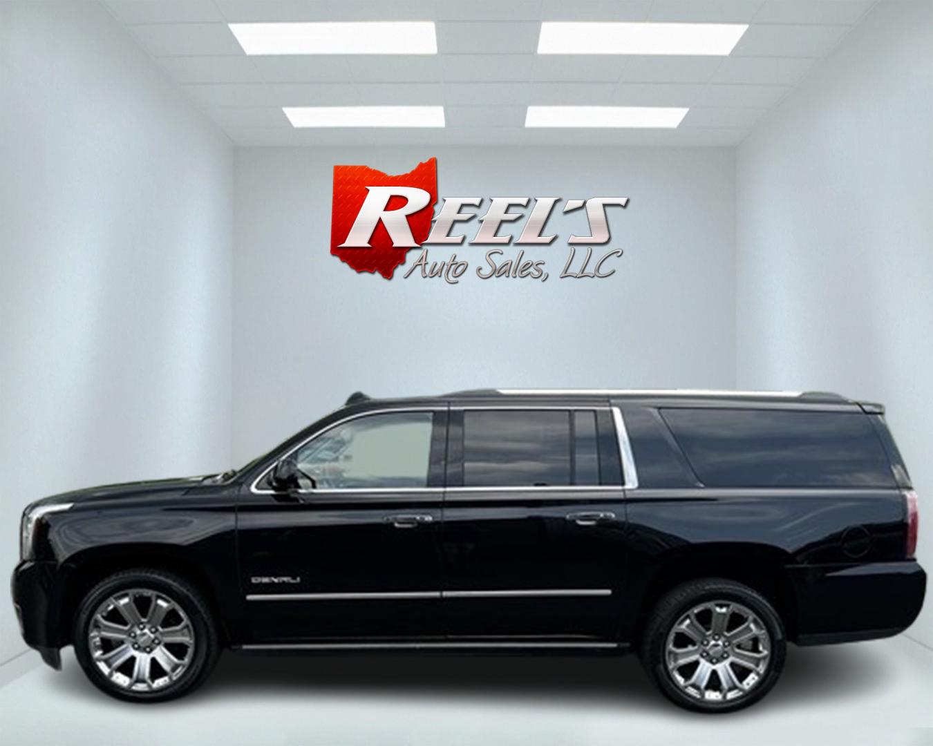 2018 Black /Black GMC Yukon XL Denali 4WD (1GKS2HKJ0JR) with an 6.2L V8 OHV 16V engine, 10 Speed Auto transmission, located at 547 E. Main St., Orwell, OH, 44076, (440) 437-5893, 41.535435, -80.847855 - This 2018 GMC Yukon XL Denali 4WD, powered by a robust 6.2 V8 engine with a 10-speed automatic transmission delivering 420 HP, is a powerful and luxurious full-size SUV. With a 7,900-pound towing capacity, it is well-suited for heavy-duty tasks. The HID headlights, LED daytime running lights, and ra - Photo#8