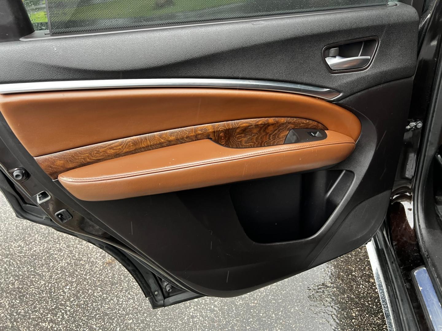 2017 Black /Brown Acura MDX SH-AWD w/Advance and Entertainment (5FRYD4H91HB) with an 3.5L V6 SOHC 24V engine, 9-Speed Automatic transmission, located at 11115 Chardon Rd. , Chardon, OH, 44024, (440) 214-9705, 41.580246, -81.241943 - Photo#41