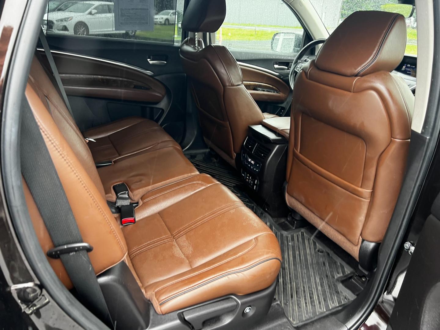 2017 Black /Brown Acura MDX SH-AWD w/Advance and Entertainment (5FRYD4H91HB) with an 3.5L V6 SOHC 24V engine, 9-Speed Automatic transmission, located at 11115 Chardon Rd. , Chardon, OH, 44024, (440) 214-9705, 41.580246, -81.241943 - Photo#47