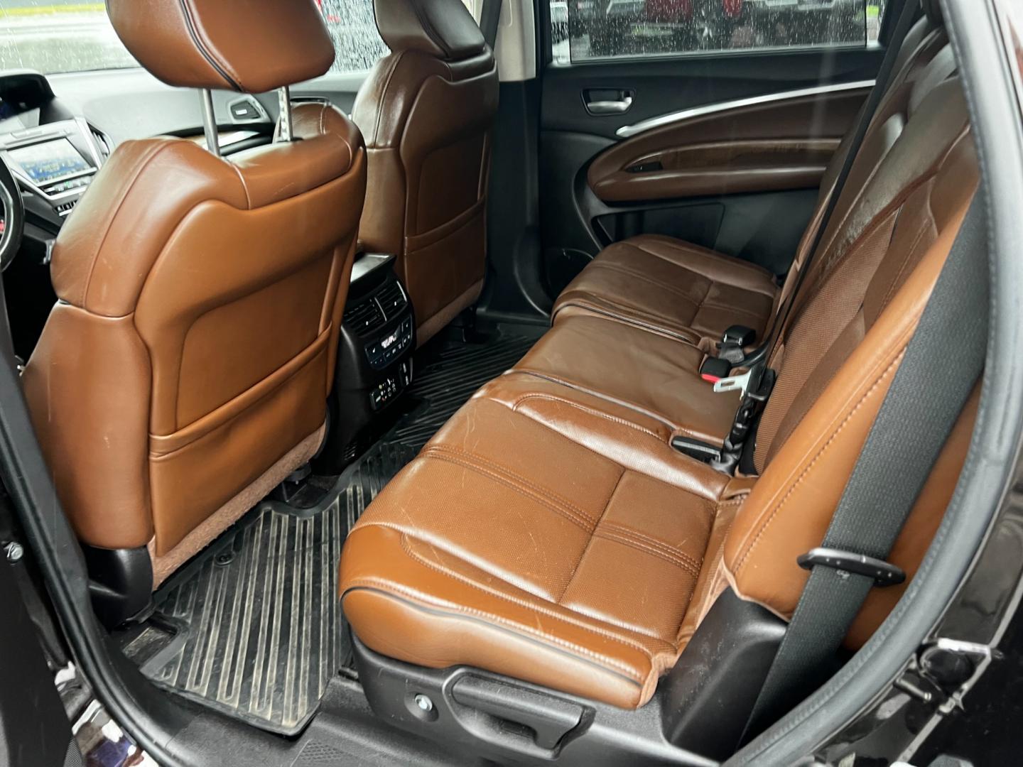 2017 Black /Brown Acura MDX SH-AWD w/Advance and Entertainment (5FRYD4H91HB) with an 3.5L V6 SOHC 24V engine, 9-Speed Automatic transmission, located at 11115 Chardon Rd. , Chardon, OH, 44024, (440) 214-9705, 41.580246, -81.241943 - Photo#40