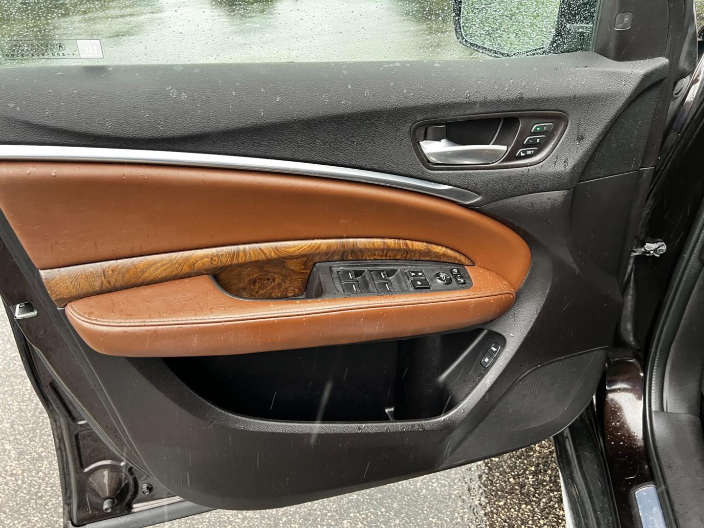 2017 Black /Brown Acura MDX SH-AWD w/Advance and Entertainment (5FRYD4H91HB) with an 3.5L V6 SOHC 24V engine, 9-Speed Automatic transmission, located at 11115 Chardon Rd. , Chardon, OH, 44024, (440) 214-9705, 41.580246, -81.241943 - Photo#16