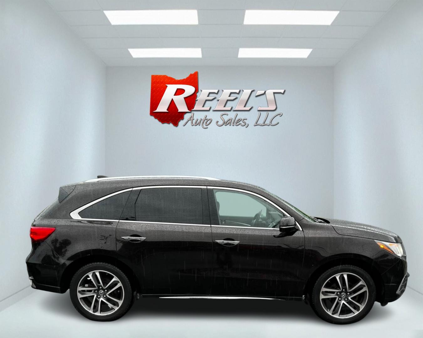 2017 Black /Brown Acura MDX SH-AWD w/Advance and Entertainment (5FRYD4H91HB) with an 3.5L V6 SOHC 24V engine, 9-Speed Automatic transmission, located at 11115 Chardon Rd. , Chardon, OH, 44024, (440) 214-9705, 41.580246, -81.241943 - Photo#4