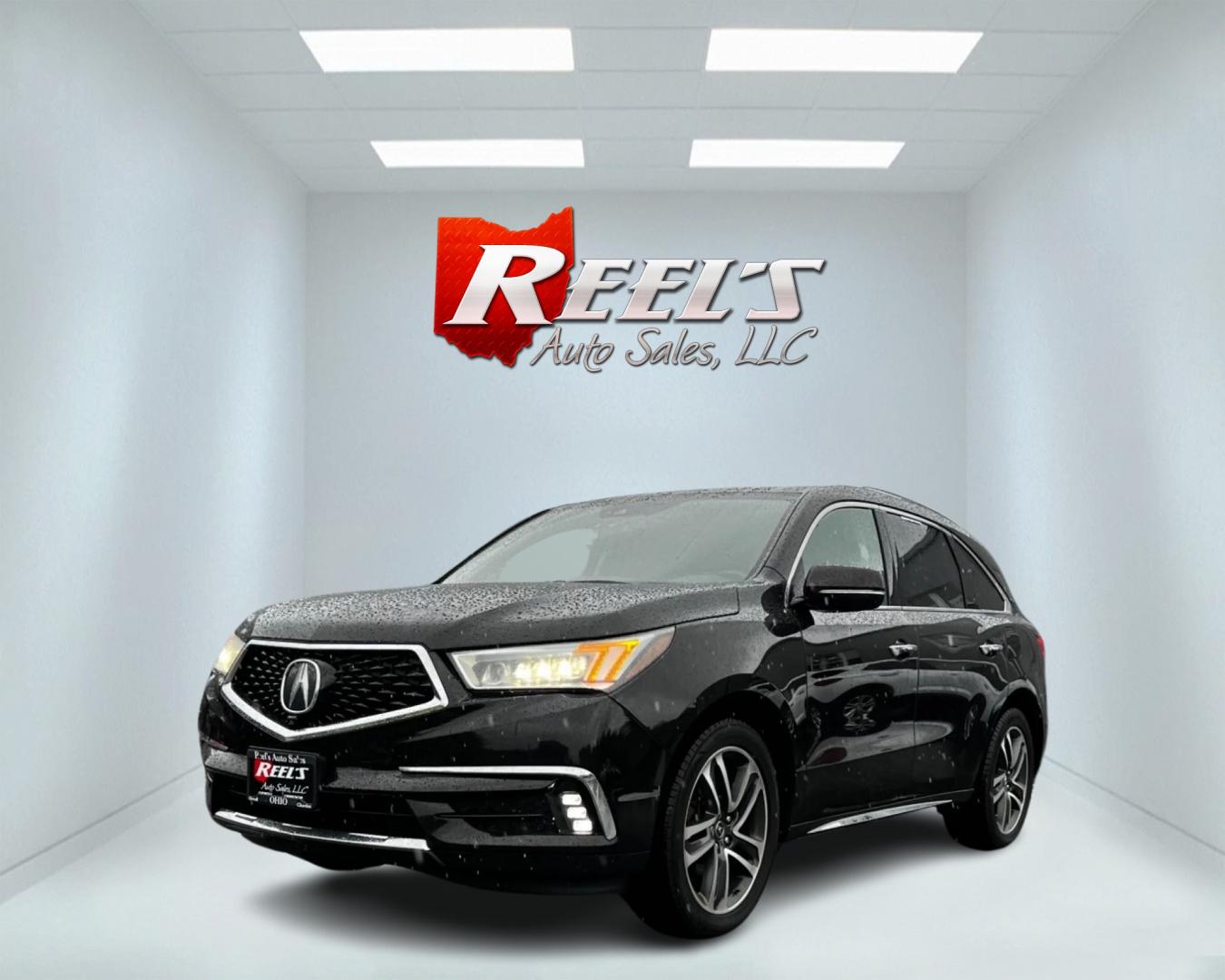 2017 Black /Brown Acura MDX SH-AWD w/Advance and Entertainment (5FRYD4H91HB) with an 3.5L V6 SOHC 24V engine, 9-Speed Automatic transmission, located at 11115 Chardon Rd. , Chardon, OH, 44024, (440) 214-9705, 41.580246, -81.241943 - Photo#0