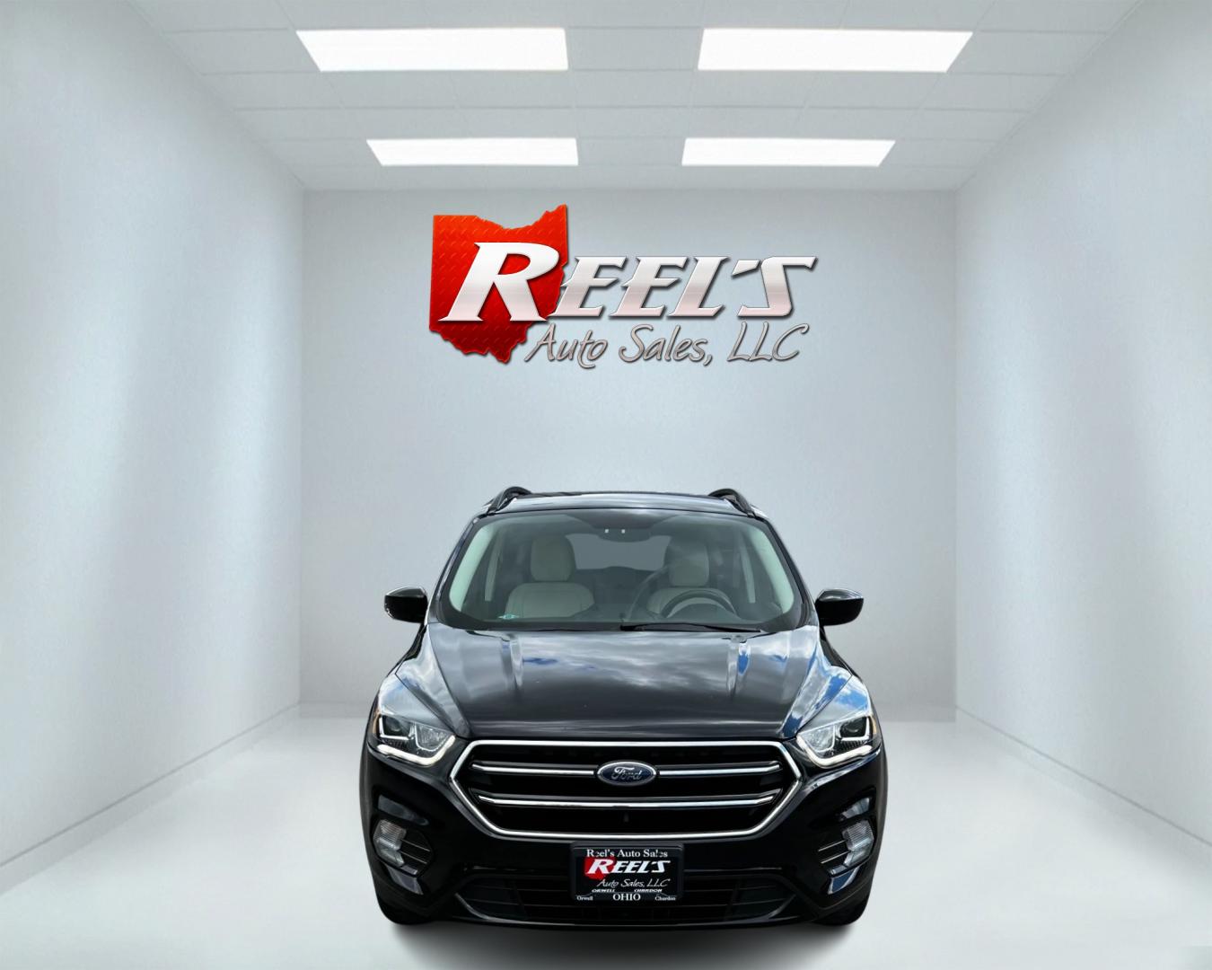 2018 Black /White Ford Escape SEL 4WD (1FMCU9HD1JU) with an 1.5L I4 DOHC 16V TURBO engine, 6A transmission, located at 547 E. Main St., Orwell, OH, 44076, (440) 437-5893, 41.535435, -80.847855 - Photo#1