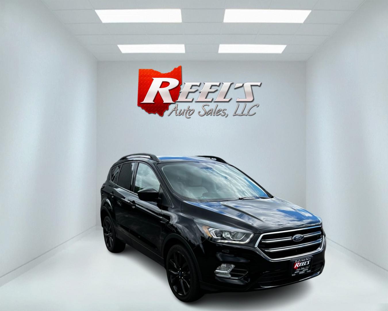 2018 Black /White Ford Escape SEL 4WD (1FMCU9HD1JU) with an 1.5L I4 DOHC 16V TURBO engine, 6A transmission, located at 547 E. Main St., Orwell, OH, 44076, (440) 437-5893, 41.535435, -80.847855 - Photo#2