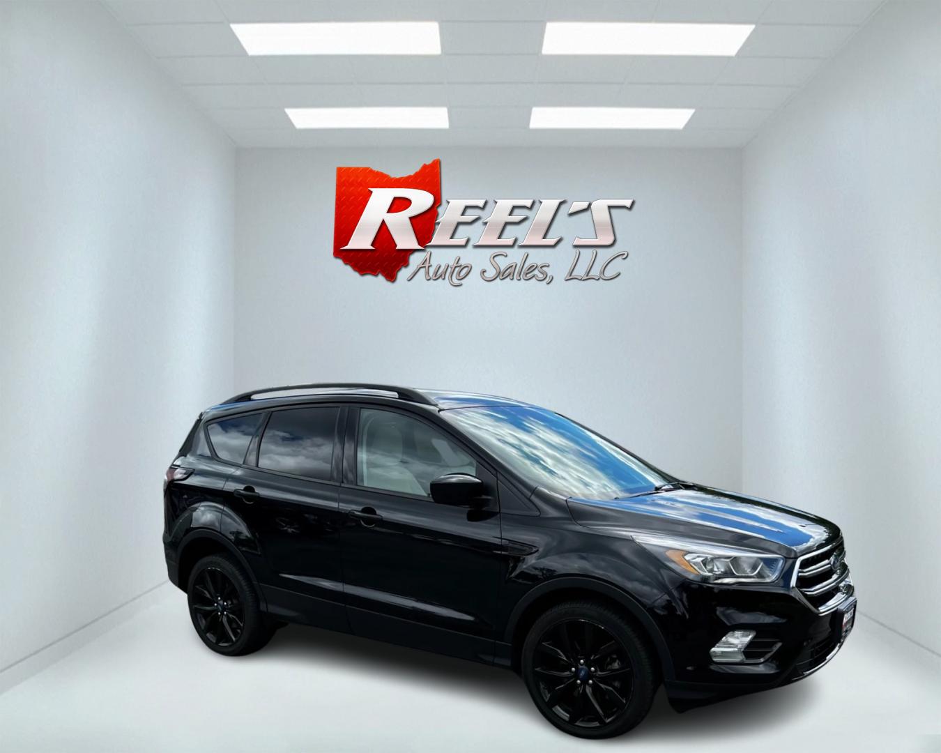 2018 Black /White Ford Escape SEL 4WD (1FMCU9HD1JU) with an 1.5L I4 DOHC 16V TURBO engine, 6A transmission, located at 547 E. Main St., Orwell, OH, 44076, (440) 437-5893, 41.535435, -80.847855 - Photo#3