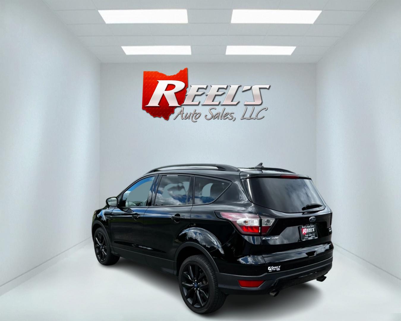 2018 Black /White Ford Escape SEL 4WD (1FMCU9HD1JU) with an 1.5L I4 DOHC 16V TURBO engine, 6A transmission, located at 547 E. Main St., Orwell, OH, 44076, (440) 437-5893, 41.535435, -80.847855 - Photo#6