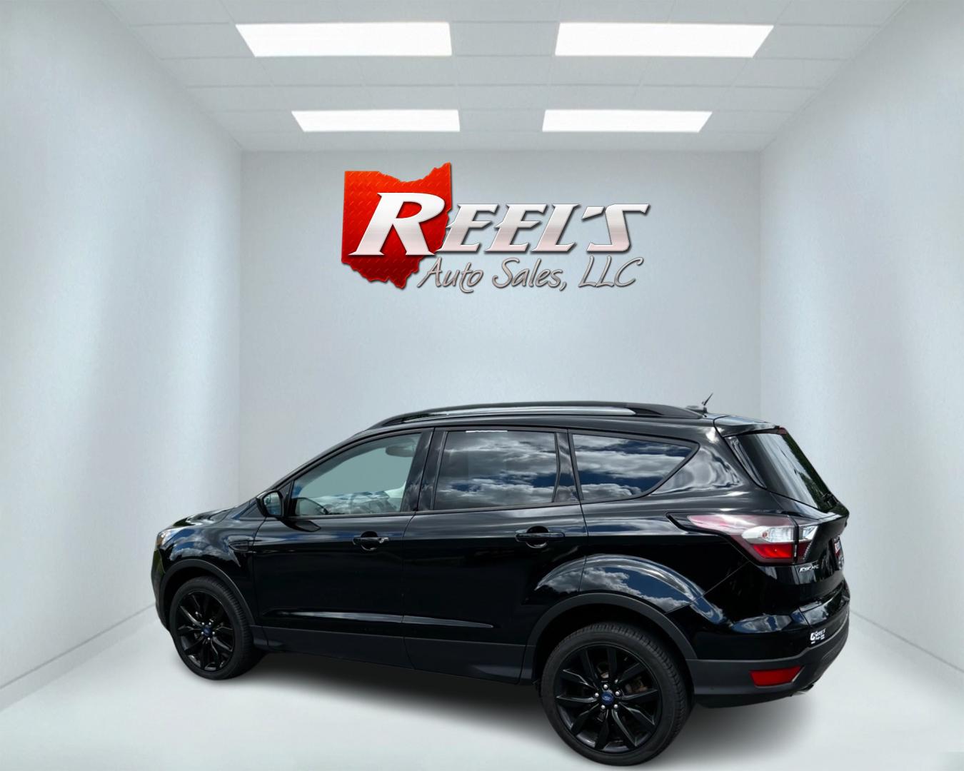 2018 Black /White Ford Escape SEL 4WD (1FMCU9HD1JU) with an 1.5L I4 DOHC 16V TURBO engine, 6A transmission, located at 547 E. Main St., Orwell, OH, 44076, (440) 437-5893, 41.535435, -80.847855 - Photo#7