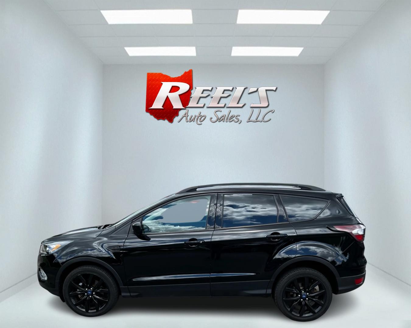 2018 Black /White Ford Escape SEL 4WD (1FMCU9HD1JU) with an 1.5L I4 DOHC 16V TURBO engine, 6A transmission, located at 547 E. Main St., Orwell, OH, 44076, (440) 437-5893, 41.535435, -80.847855 - Photo#8