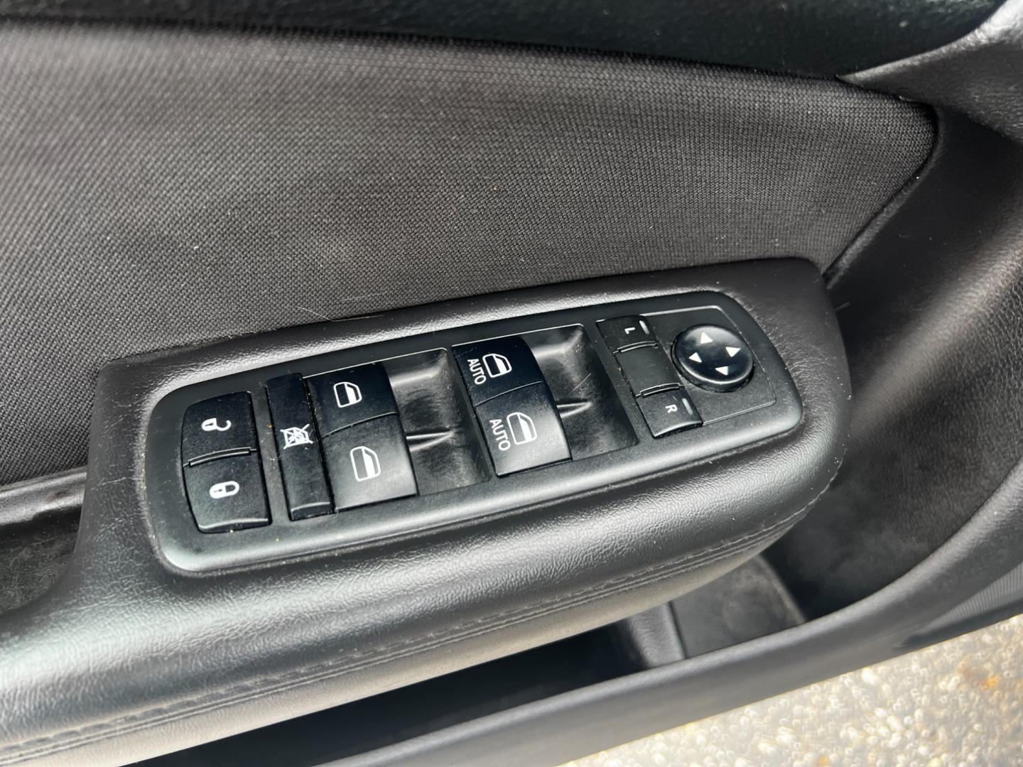 2016 Green /Black Chrysler 200 Limited (1C3CCCABXGN) with an 2.4L I4 SOHC 16V engine, 9A transmission, located at 547 E. Main St., Orwell, OH, 44076, (440) 437-5893, 41.535435, -80.847855 - Photo#17
